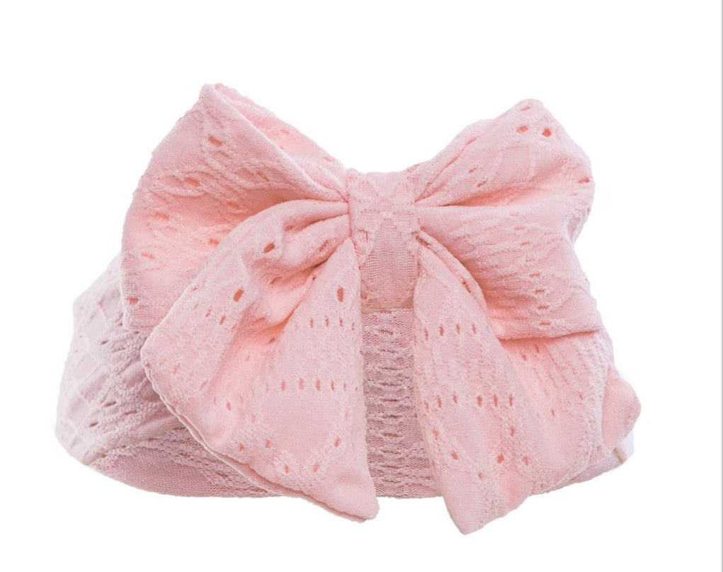 Soft touch pink cable bow headband
