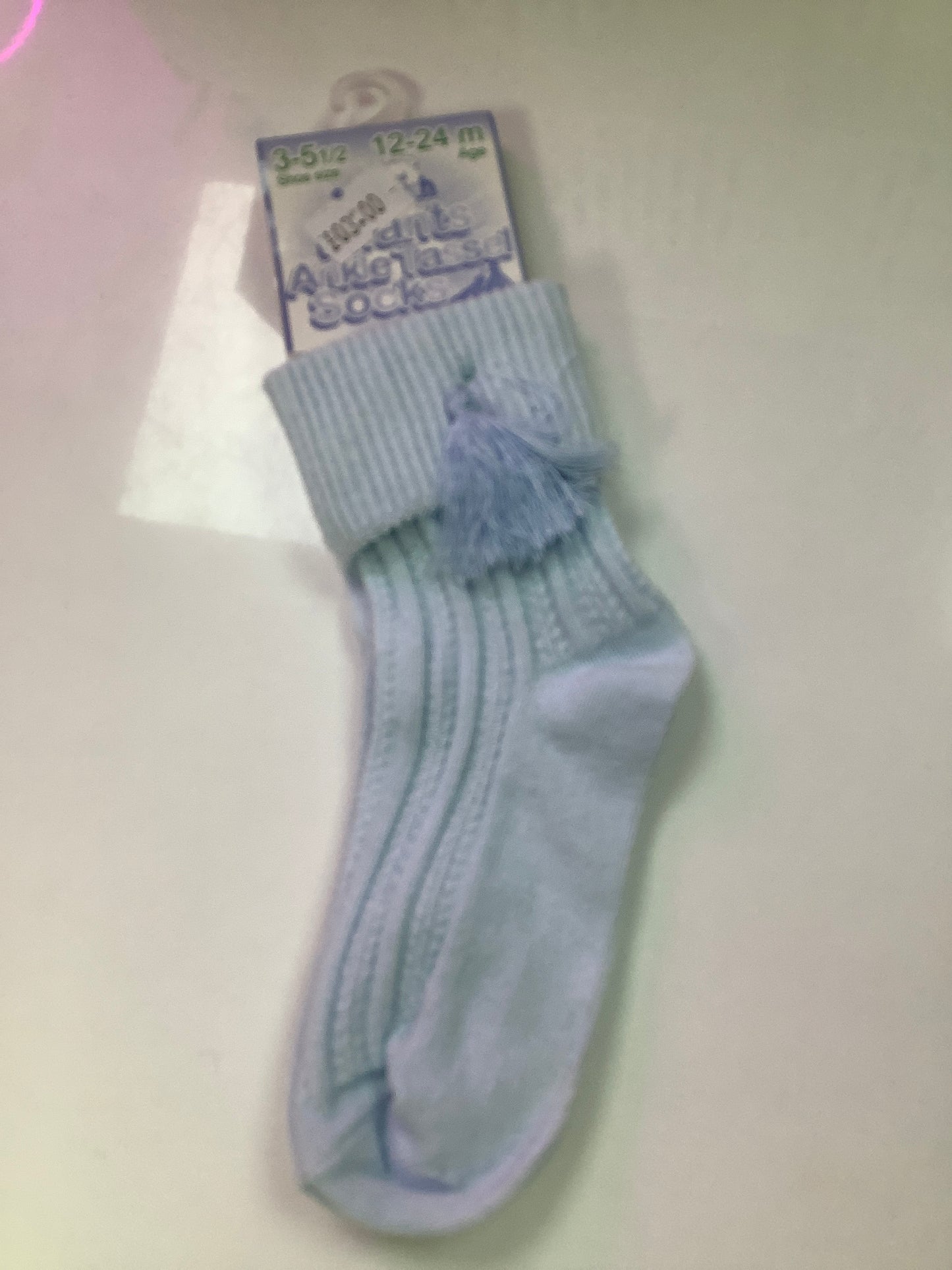 Baby blue ankle socks with tassels