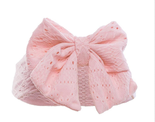 Soft touch pink cable bow headband