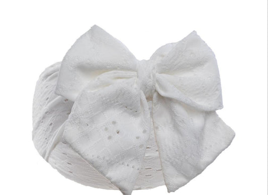 Soft touch white cable bow headband